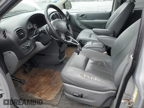 2006 Dodge Grand Caravan SXT z VIN 2D4GP44L56R786238, wystawiony jako Copart lot #55799425 z przebiegiem 173 150 mil mil oraz Czysty tytuł • Clean title. Historia ofert i sprzedaży dostępna na DreamBid. Obrazek 7.