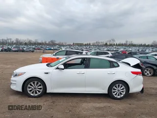 2016 Kia Optima EX with VIN 5XXGU4L31GG027250, listed as a IAAI auction lot 41881343 with 135,635 mi miles. Bid and sale history available at carsss.com. Image 14.