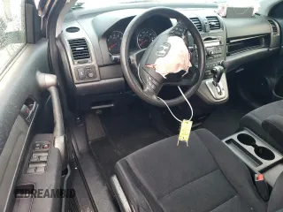 2011 Honda CR-V SE z VIN JHLRE4H49BC010974, wystawiony jako Copart lot #57595415 z przebiegiem Nie podano mil oraz Szkoda całkowita • Salvage title. Historia ofert i sprzedaży dostępna na DreamBid. Obrazek 8.