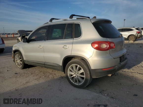 2011 Volkswagen Tiguan SEL w/Premium Navi with VIN WVGAV7AX8BW542758, listed as a Copart auction lot 49356485 with 77,958 mi miles and Salvage Title. Bid and sale history available at DreamBid. Image 2.