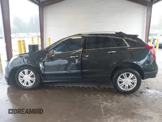 2011 Cadillac SRX Luxury Collection z VIN 3GYFNAEY4BS655011, wystawiony jako IAAI lot #41990104 z przebiegiem 133 246 mil mil oraz . Historia ofert i sprzedaży dostępna na DreamBid. Obrazek 14.