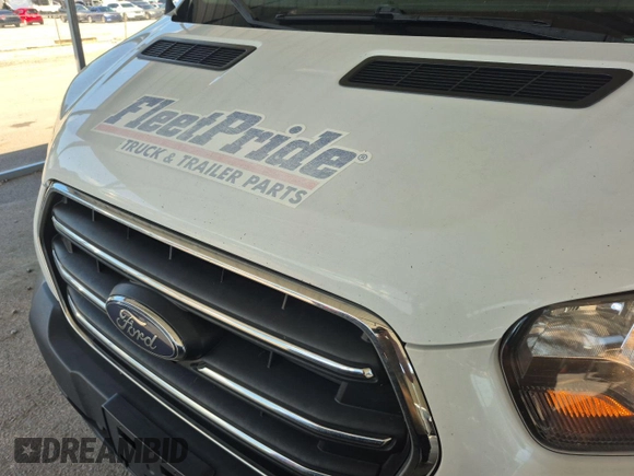 2020 Ford Transit Cargo with VIN 1FTYE1C89LKA17335, listed as a IAAI auction lot 42667415 with 276,728 mi miles and . Bid and sale history available at DreamBid. Image 12.
