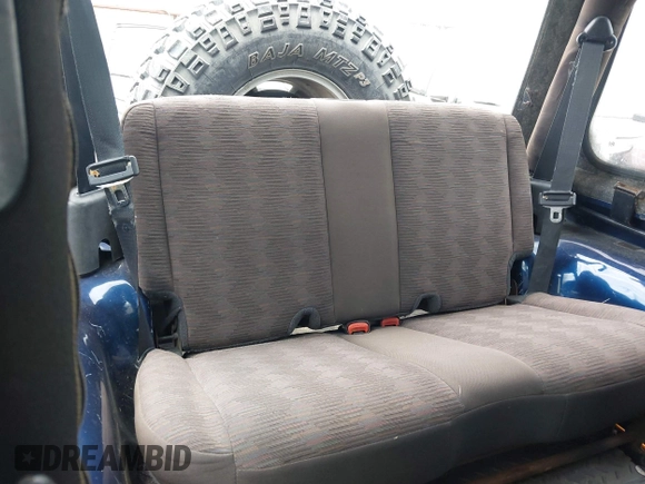 2005 Jeep Wrangler X with VIN 1J4FA39S15P320367, listed as a IAAI auction lot 42114102 with 142,132 mi miles and . Bid and sale history available at DreamBid. Image 8.