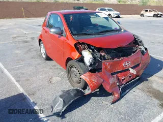 2012 Scion iQ with VIN JTNJJXB02CJ012765, listed as a IAAI auction lot 42406771 with 104,162 mi miles and . Bid and sale history available at DreamBid. Image 1.