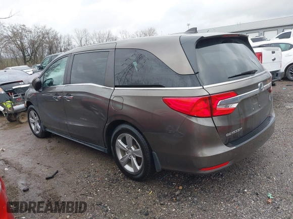 2018 Honda Odyssey EX-L with VIN 5FNRL6H72JB081086, listed as a IAAI auction lot 41031370 with 73,907 mi miles and . Bid and sale history available at DreamBid. Image 3.