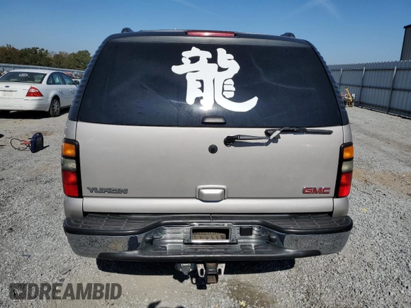 2006 GMC Yukon SLT with VIN 1GKEK13T96J110533, listed as a Copart auction lot 77797364 with 209,339 mi miles and Salvage Title. Bid and sale history available at carsss.com. Image 6.