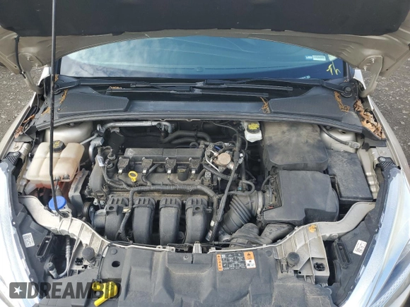 2017 Ford Focus SE z VIN 1FADP3F2XHL335127, wystawiony jako Copart lot #56119005 z przebiegiem 58 272 mil mil oraz Szkoda całkowita • Salvage title. Historia ofert i sprzedaży dostępna na DreamBid. Obrazek 11.