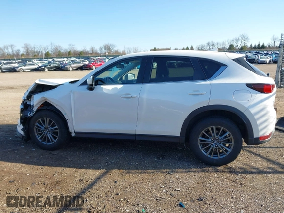 2017 Mazda CX-5 Touring with VIN JM3KFBCL4H0125501, listed as a IAAI auction lot 41979179 with 109,926 mi miles. Bid and sale history available at carsss.com. Image 15.