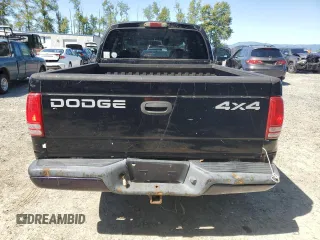 2001 Dodge Dakota Sport z VIN 1B7GG2AN81S113605, wystawiony jako Copart lot #58990065 z przebiegiem 243 919 mil mil oraz Tytuł czysty. Historia ofert i sprzedaży dostępna na DreamBid. Obrazek 6.