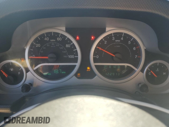 2008 Jeep Wrangler Unlimited Sahara with VIN 1J4GA59178L607960, listed as a Copart auction lot 57855995 with 122,913 mi miles and Salvage title. Bid and sale history available at DreamBid. Image 9.