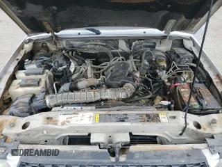 2002 Ford Ranger XLT Off-Road z VIN 1FTZR45U12TA27368, wystawiony jako Copart lot #87229374 z przebiegiem 111 159 mil mil oraz Szkoda całkowita • Salvage title. Historia ofert i sprzedaży dostępna na DreamBid. Obrazek 11.