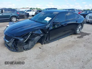 2025 Cadillac CT5 Sport с VIN 1G6DP5RK3S0100470, выставлен на аукционе IAAI как лот 42386329 с пробегом 6 143 миль миль и . История ставок и продаж доступна на DreamBid. Изображение 2.