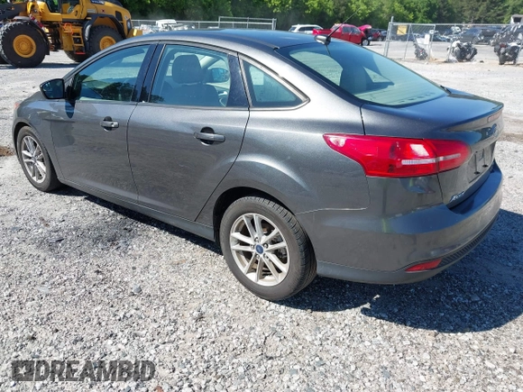 2018 Ford Focus SE z VIN 1FADP3FE1JL238012, wystawiony jako IAAI lot #42185232 z przebiegiem 143 687 mil mil oraz . Historia ofert i sprzedaży dostępna na DreamBid. Obrazek 3.