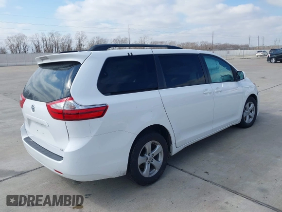 2016 Toyota Sienna LE AAS with VIN 5TDKK3DC2GS731724, listed as a IAAI auction lot 41631571 with 88,900 mi miles. Bid and sale history available at carsss.com. Image 4.