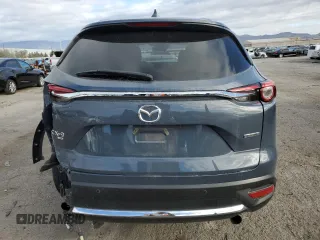2023 Mazda CX-9 Carbon Edition with VIN JM3TCBDY0P0650772, listed as a Copart auction lot 48994315 with 14,758 mi miles and Salvage title. Bid and sale history available at DreamBid. Image 6.