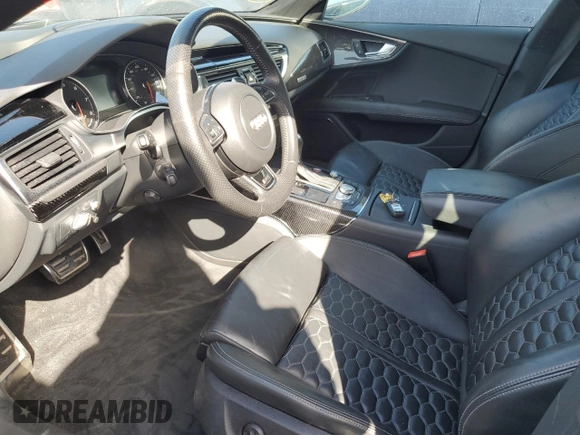 2016 Audi RS 7 Prestige z VIN WUAW2AFC2GN900328, wystawiony jako Copart lot #74450074 z przebiegiem Nie podano mil oraz Nie do naprawy. Historia ofert i sprzedaży dostępna na DreamBid. Obrazek 7.