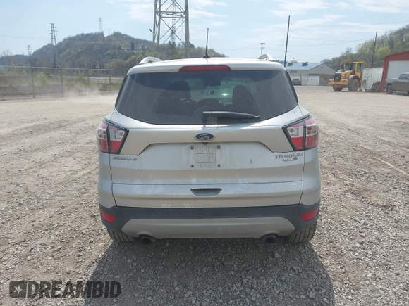 2017 Ford Escape Titanium with VIN 1FMCU9JD0HUE42509, listed as a IAAI auction lot 42079984 with 1 mi miles. Bid and sale history available at carsss.com. Image 17.
