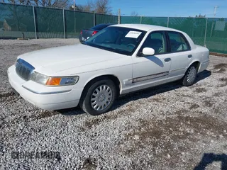 1999 Mercury Grand Marquis GS z VIN 2MEFM74W0XX686623, wystawiony jako IAAI lot #41828993 z przebiegiem 245 171 mil mil oraz . Historia ofert i sprzedaży dostępna na DreamBid. Obrazek 2.