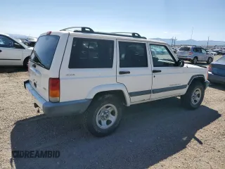 2000 Jeep Cherokee with VIN 1J4FF48S6YL169224, listed as a Copart auction lot 64411145 with 237,553 mi miles and Clean title. Bid and sale history available at DreamBid. Image 3.