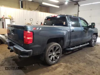 2018 Chevrolet Silverado 1500 LT with VIN 3GCUKREC5JG121283, listed as a Copart auction lot 49836155 with 95,838 mi miles and Salvage Title. Bid and sale history available at DreamBid. Image 3.