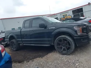 2018 Ford F-150 XL with VIN 1FTEX1EP1JKC22405, listed as a IAAI auction lot 42143837 with 111,597 mi miles and . Bid and sale history available at DreamBid. Image 14.