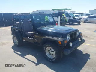 1998 Jeep Wrangler Sport with VIN 1J4FY19S8WP772141, listed as a IAAI auction lot 41842977 with 156,633 mi miles. Bid and sale history available at carsss.com. Image 1.