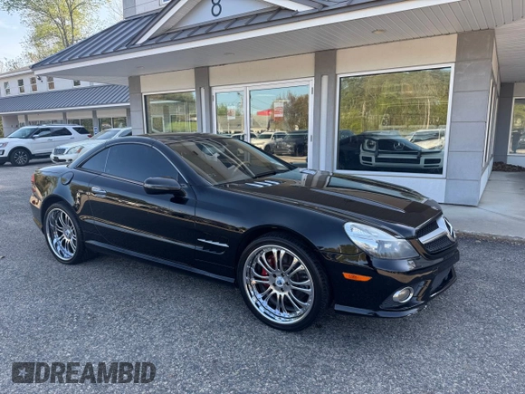 2009 Mercedes-Benz SL 550 with VIN WDBSK71F69F148290, listed as a Copart auction lot 56976645 with 161,833 mi miles and Clean title. Bid and sale history available at DreamBid. Image 1.