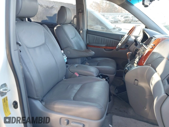 2009 Toyota Sienna XLE with VIN 5TDZK22C69S241205, listed as a IAAI auction lot 40980902 with 250,335 mi miles and . Bid and sale history available at DreamBid. Image 5.