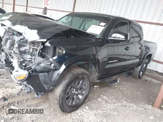 2023 Toyota Tacoma 4WD SR with VIN 3TMCZ5AN8PM538298, listed as a IAAI auction lot 41472145 with 66,484 mi miles. Bid and sale history available at carsss.com. Image 17.