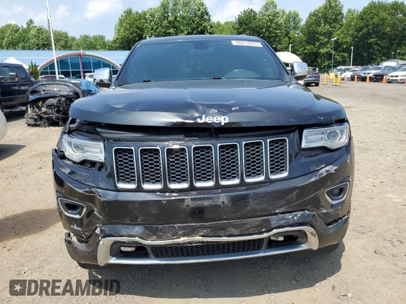 2015 Jeep Grand Cherokee Overland с VIN 1C4RJFCG4FC104420, выставлен на аукционе Copart как лот 66014955 с пробегом 165 645 миль миль и Списание • Salvage title. История ставок и продаж доступна на DreamBid. Изображение 5.