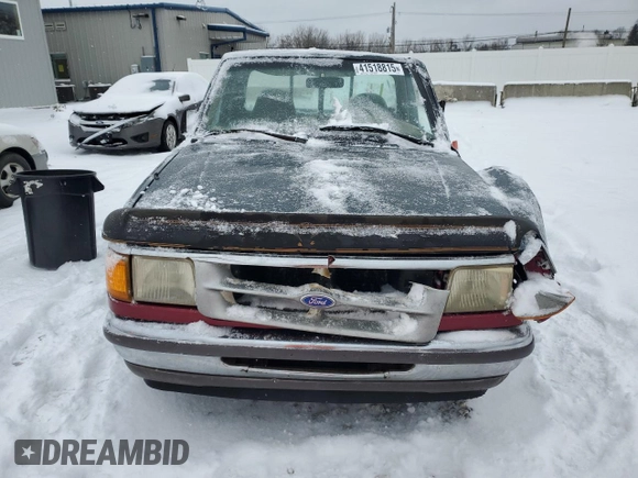 1997 Ford Ranger XLT with VIN 1FTCR10AXVUD48518, listed as a Copart auction lot 41518815 with 400,246 mi miles and Salvage title. Bid and sale history available at DreamBid. Image 5.