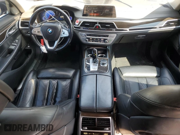2016 BMW 7 Series 740i with VIN WBA7E2C59GG547804, listed as a Copart auction lot 68620463 with 122,937 mi miles. Bid and sale history available at carsss.com. Image 8.