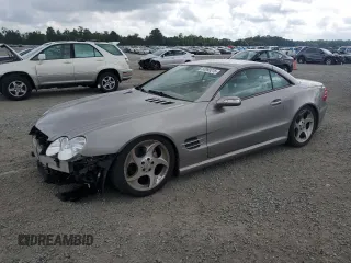2005 Mercedes-Benz SL 500 with VIN WDBSK75F95F100464, listed as a Copart auction lot 60993215 with 84,890 mi miles and Salvage title. Bid and sale history available at DreamBid. Image 1.