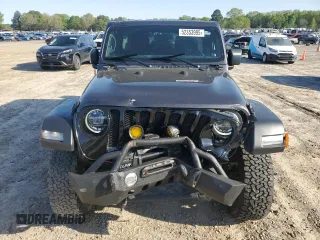 2022 Jeep Wrangler Unlimited Willys with VIN 1C4HJXDG1NW102069, listed as a Copart auction lot 52353995 with 33,328 mi miles and Salvage Title. Bid and sale history available at DreamBid. Image 5.