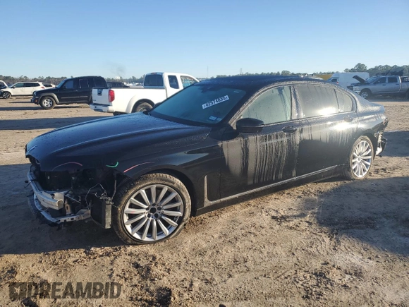 2020 BMW 7 Series 740i with VIN WBA7T2C0XLCE02429, listed as a Copart auction lot 42574835 with 73,970 mi miles and Salvage Title. Bid and sale history available at carsss.com. Image 1.