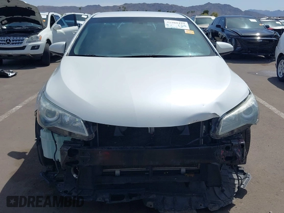 2015 Toyota Camry XLE with VIN 4T1BF1FK4FU477825, listed as a IAAI auction lot 41988429 with 156,886 mi miles and . Bid and sale history available at DreamBid. Image 6.