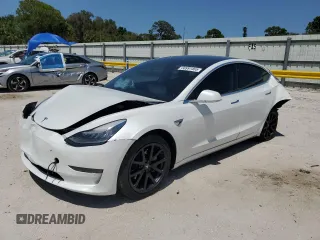 2020 Tesla Model 3 Long Range z VIN 5YJ3E1EBXLF637028, wystawiony jako Copart lot #56991465 z przebiegiem Nie podano mil oraz Nie do naprawy • Non repairable. Historia ofert i sprzedaży dostępna na DreamBid. Obrazek 1.