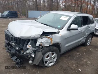 2013 Jeep Grand Cherokee Laredo with VIN 1C4RJFAGXDC537367, listed as a IAAI auction lot 41906921 with 124,679 mi miles. Bid and sale history available at carsss.com. Image 6.