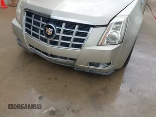 2013 Cadillac CTS Coupe Premium with VIN 1G6DS1E36D0107566, listed as a IAAI auction lot 42079197 with 122,386 mi miles. Bid and sale history available at carsss.com. Image 6.