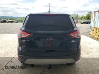 2014 Ford Escape SE z VIN 1FMCU9GX8EUC01956, wystawiony jako Copart lot #57800155 z przebiegiem 174 139 mil mil oraz Czysty tytuł • Clean title. Historia ofert i sprzedaży dostępna na DreamBid. Obrazek 6.