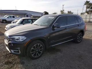 2018 BMW X5 xDrive40e iPerformance with VIN 5UXKT0C51J0W03594, listed as a Copart auction lot 47802005 with 59,670 mi miles and Salvage Title. Bid and sale history available at carsss.com. Image 1.