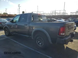 2016 Ram 1500 Rebel z VIN 1C6RR7YT6GS211830, wystawiony jako Copart lot #54072485 z przebiegiem 56 512 mil mil oraz Szkody całkowita. Historia ofert i sprzedaży dostępna na DreamBid. Obrazek 2.