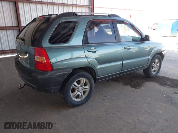 2005 Kia Sportage LX with VIN KNDJF723957065883, listed as a IAAI auction lot 42087320 with 212,726 mi miles and . Bid and sale history available at carsss.com. Image 4.