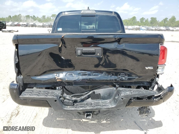 2021 Toyota Tacoma 4WD SR with VIN 5TFCZ5AN5MX268050, listed as a Copart auction lot 53967815 with 74,247 mi miles and Clean Title. Bid and sale history available at carsss.com. Image 6.