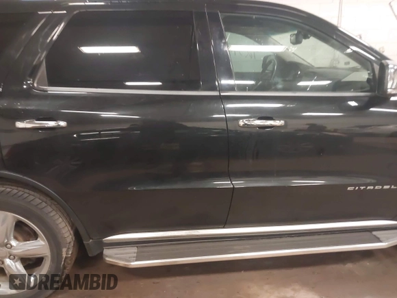 2013 Dodge Durango Citadel with VIN 1C4SDJET9DC661861, listed as a IAAI auction lot 42597126 with 187,631 mi miles and . Bid and sale history available at DreamBid. Image 13.