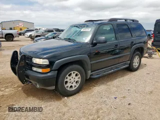 2002 Chevrolet Tahoe Z71 z VIN 1GNEK13Z12R153010, wystawiony jako Copart lot #58890235 z przebiegiem 155 031 mil mil oraz Szkoda całkowita • Salvage title. Historia ofert i sprzedaży dostępna na DreamBid. Obrazek 1.