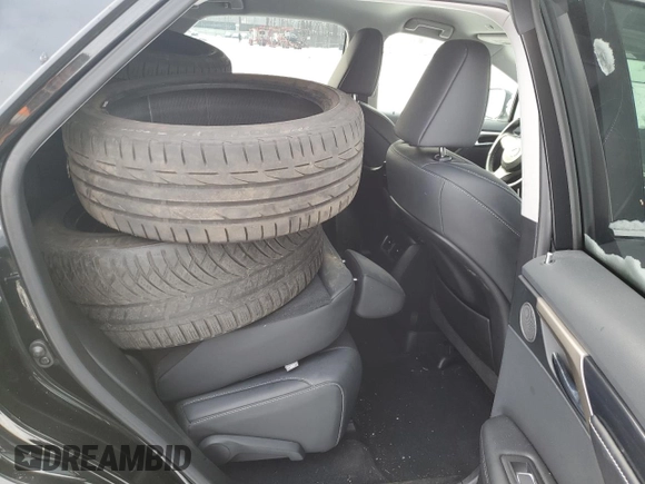 2021 Lexus RX with VIN 2T2AZMDA6MC289848, listed as a Copart auction lot 43322595 with 13,657 mi miles and Salvage Title. Bid and sale history available at carsss.com. Image 10.