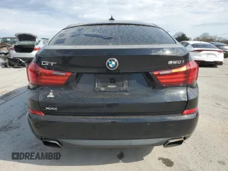 2014 BMW 5 Series GT 550i xDrive with VIN WBA5M0C58ED084910, listed as a Copart auction lot 50920985 with 118,662 mi miles and Clean Title. Bid and sale history available at carsss.com. Image 6.