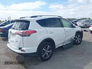 2018 Toyota RAV4 XLE with VIN JTMWFREV7JJ731893, listed as a IAAI auction lot 41567850 with 141,269 mi miles. Bid and sale history available at carsss.com. Image 4.