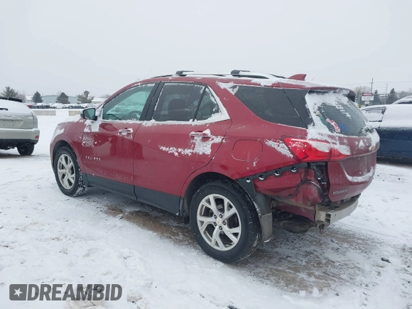 2021 Chevrolet Equinox Premier z VIN 2GNAXXEV4M6105996, wystawiony jako IAAI lot #41402065 z przebiegiem 51 083 mil mil oraz . Historia ofert i sprzedaży dostępna na DreamBid. Obrazek 3.